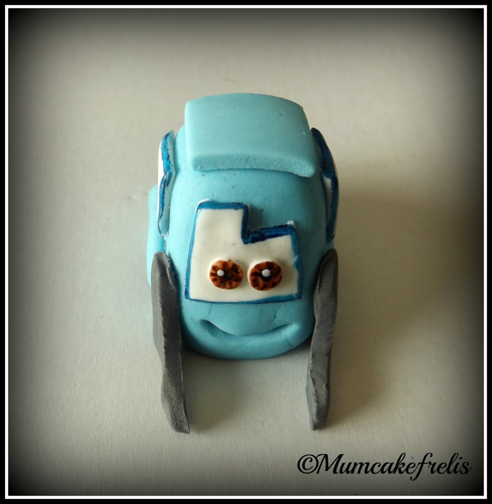 make a cake with fondant versions of some of the main characters of Radiator Springs