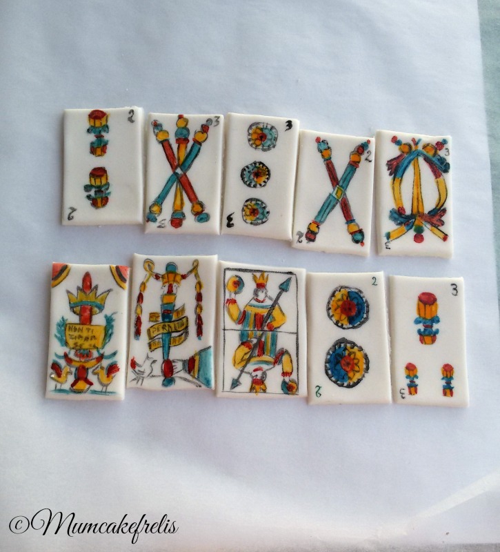 Carte da gioco in pasta di zucchero dipinte a mano